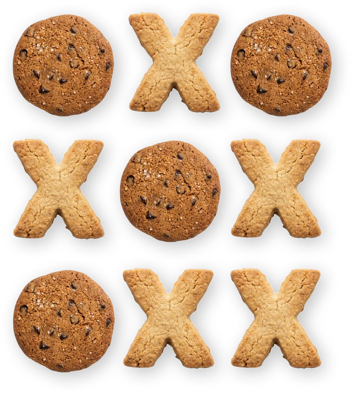 Chocolate chip cookies and X-shaped biscuits laid out as a game of tic-tac-toe